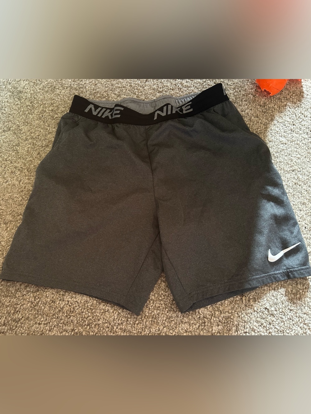Nike Dark Gray Workout Shorts with White Swoosh
